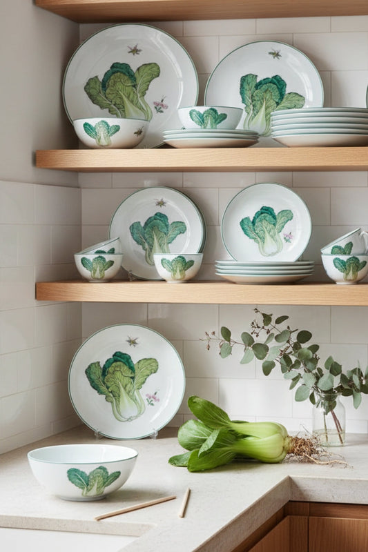 Bok choy patterned plates and bowls on wooden shelves in a modern kitchen at La Casona Edit