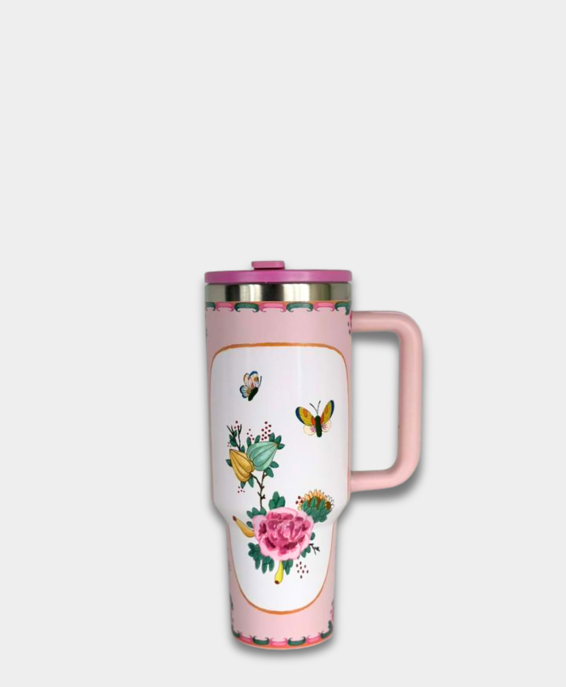 Pink floral travel mug with butterfly design from La Casona Edit on white background. Collectible tumbler inspired by vintage china, designed for everyday use. Rose Canton china pattern.
